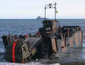 Lorry drives off landing craft